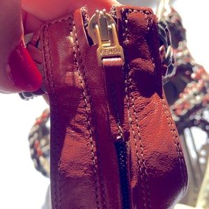 Gladiator sandals from FENDI with a chic twist.